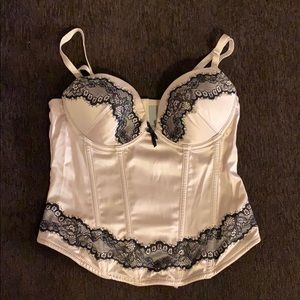 Women’s nude with black intimate top